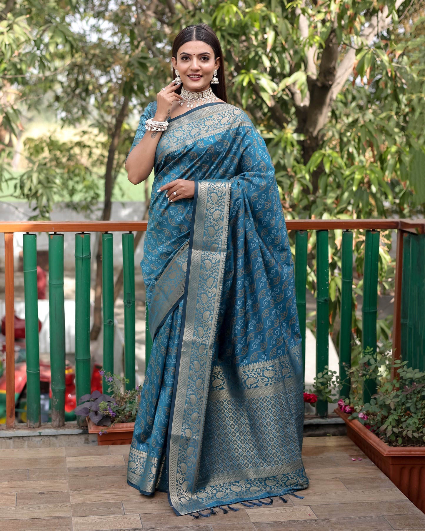 Shining Bandhej Patola Teal Color Silk Sarees