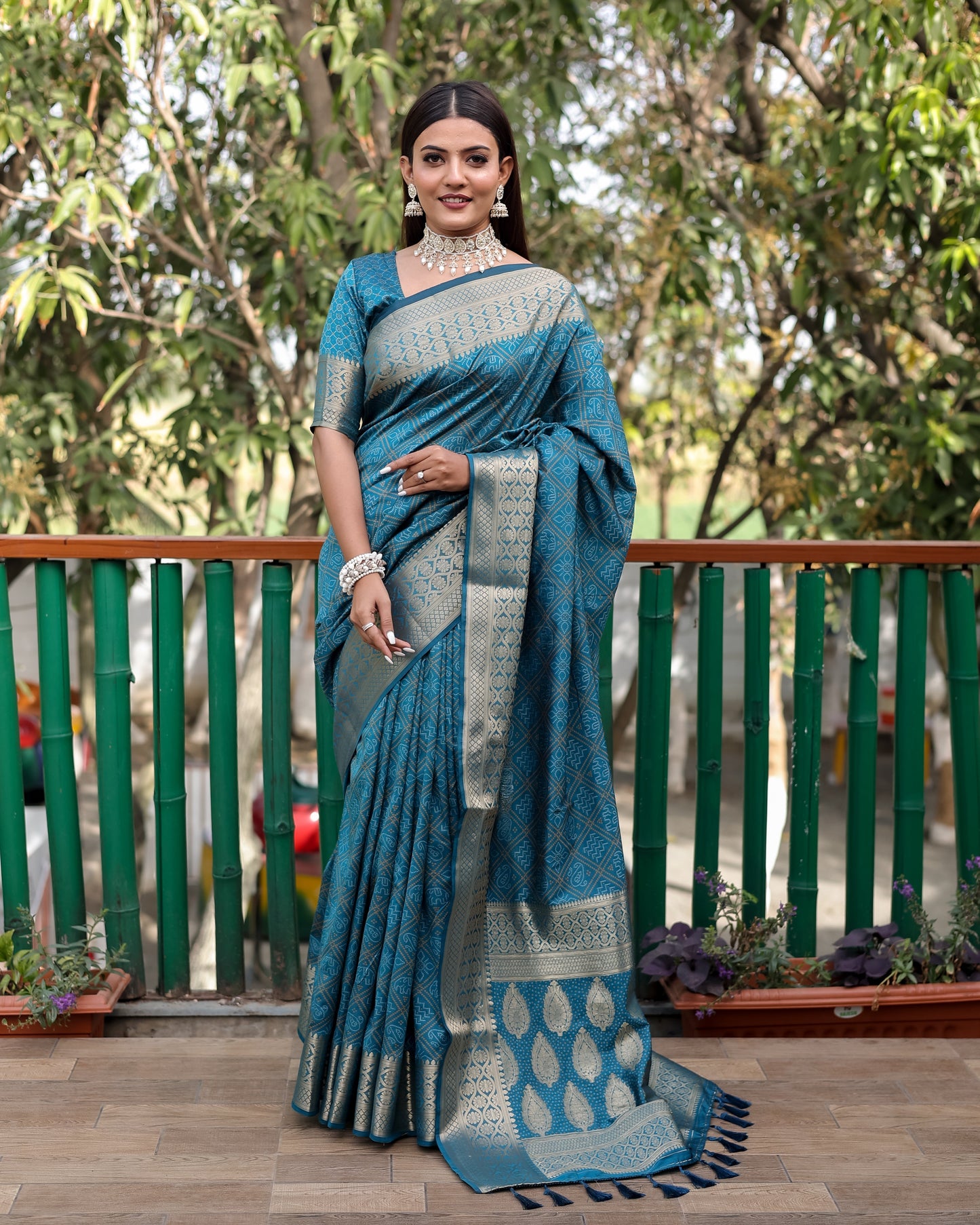 Embellished Silk Bandhej Teal Blue Color Patola Sarees