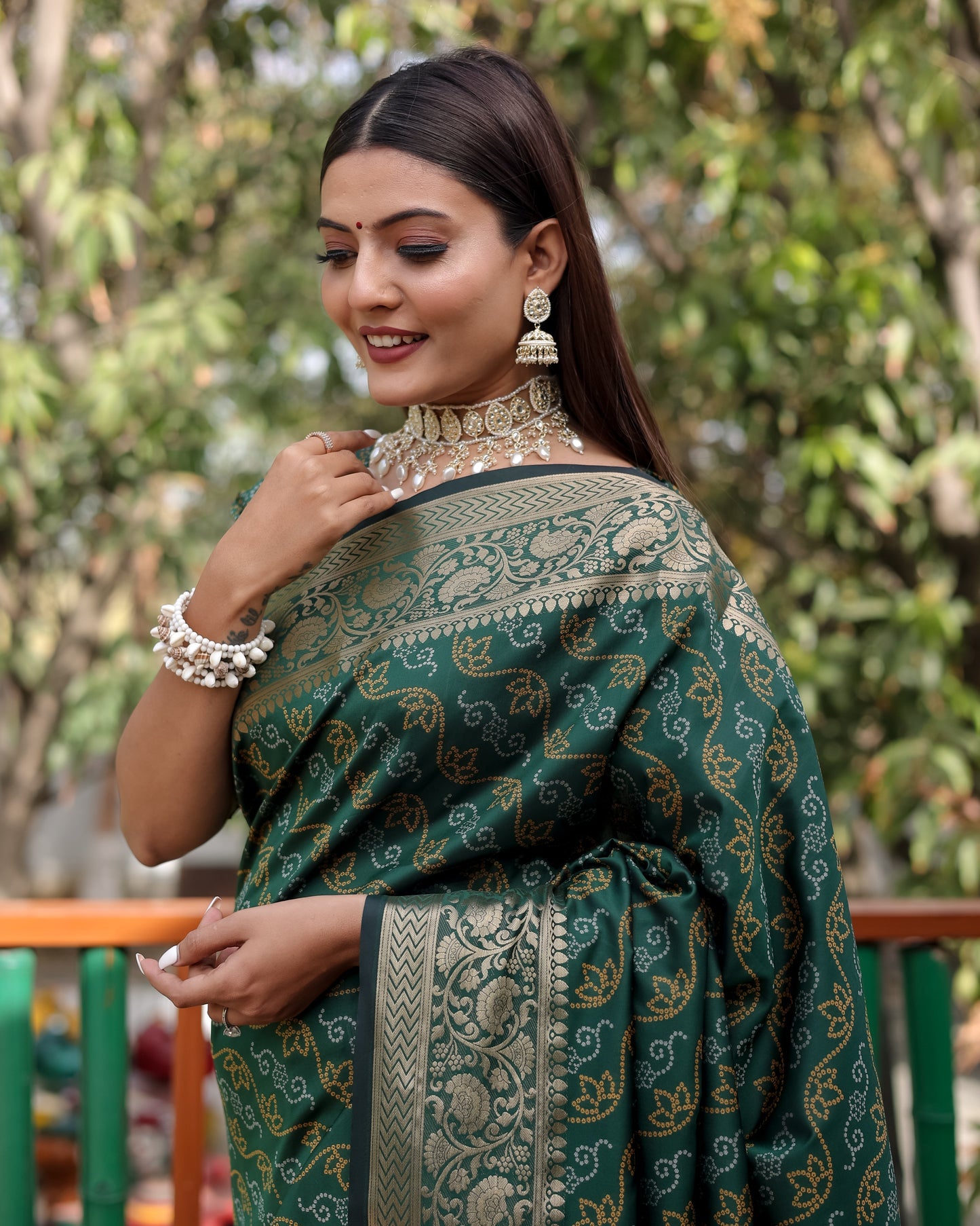 Shining Bandhej Patola Green Color Silk Sarees