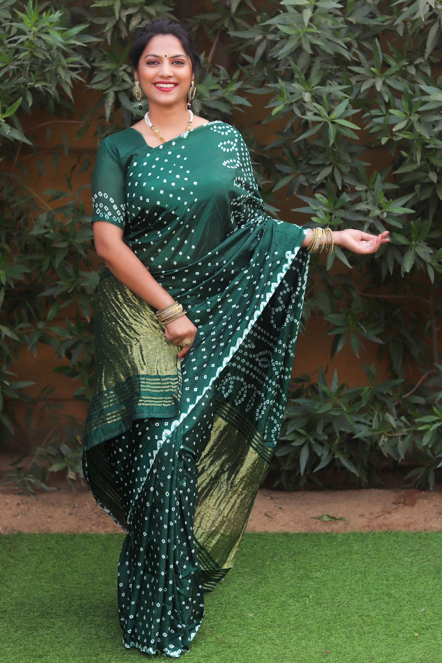 Glorious Bandhej Green Color Silk Saree