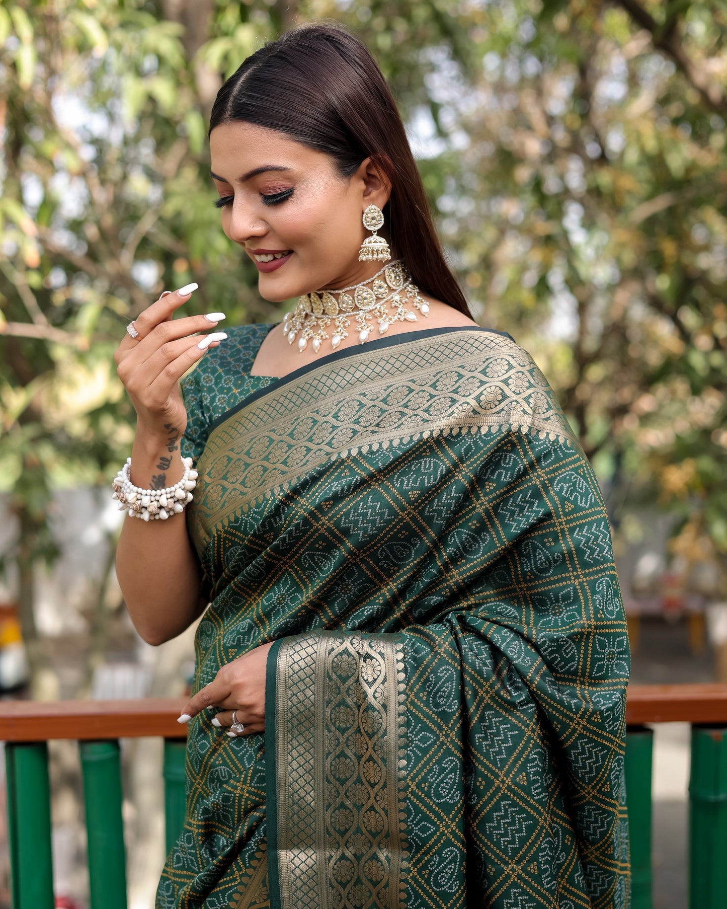 Embellished Silk Bandhej Green Color Patola Sarees