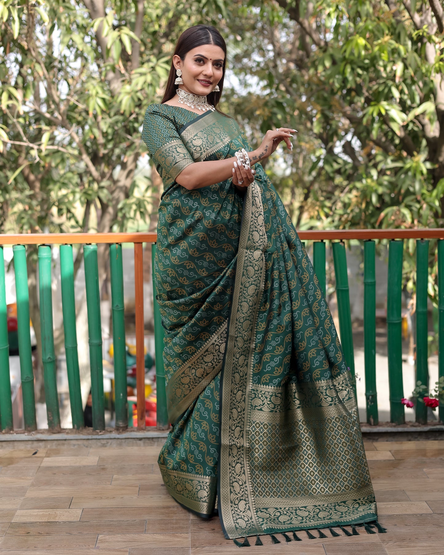 Shining Bandhej Patola Green Color Silk Sarees