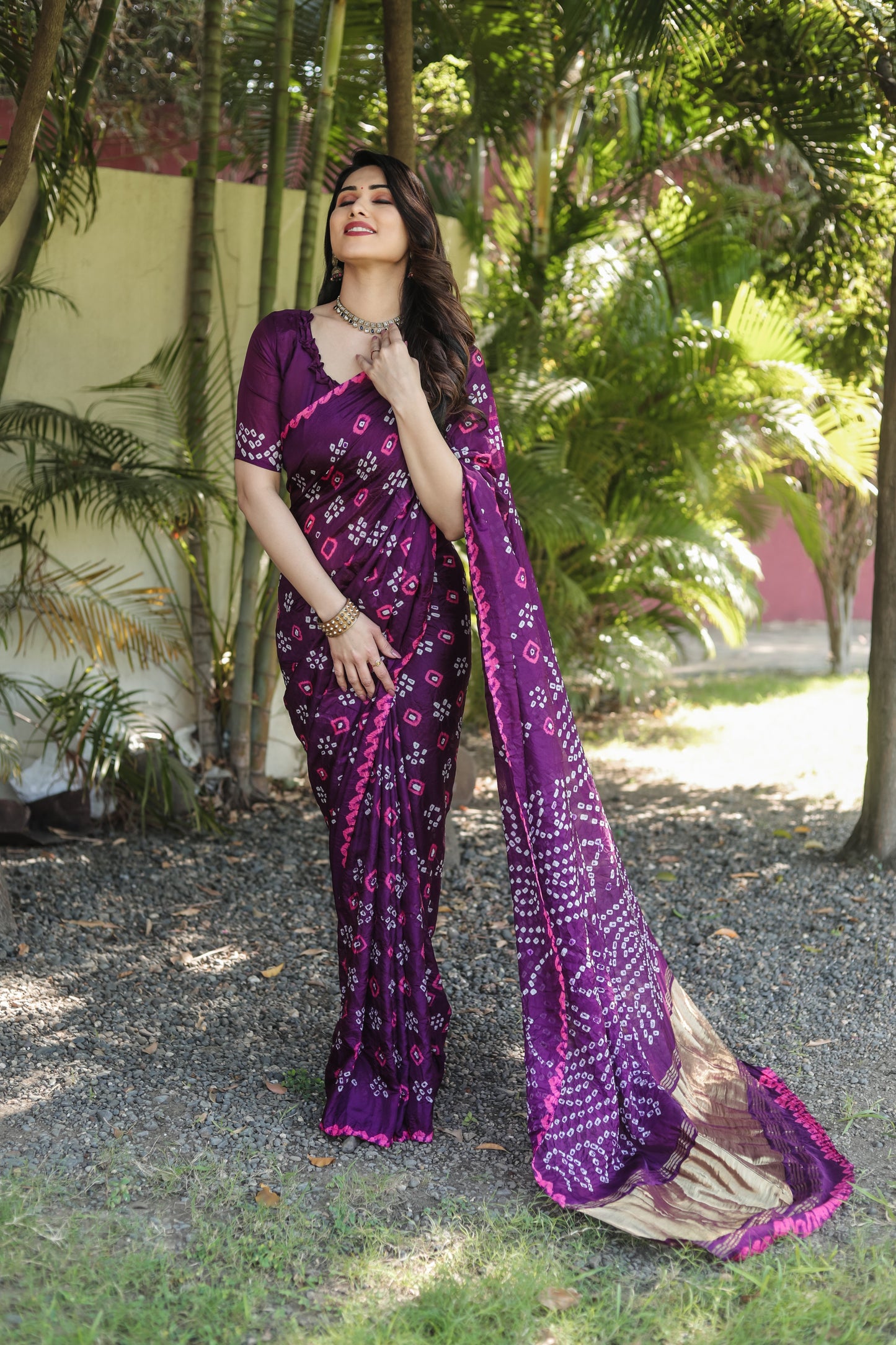 Luxuriant Bandhej Purple Color Silk Saree