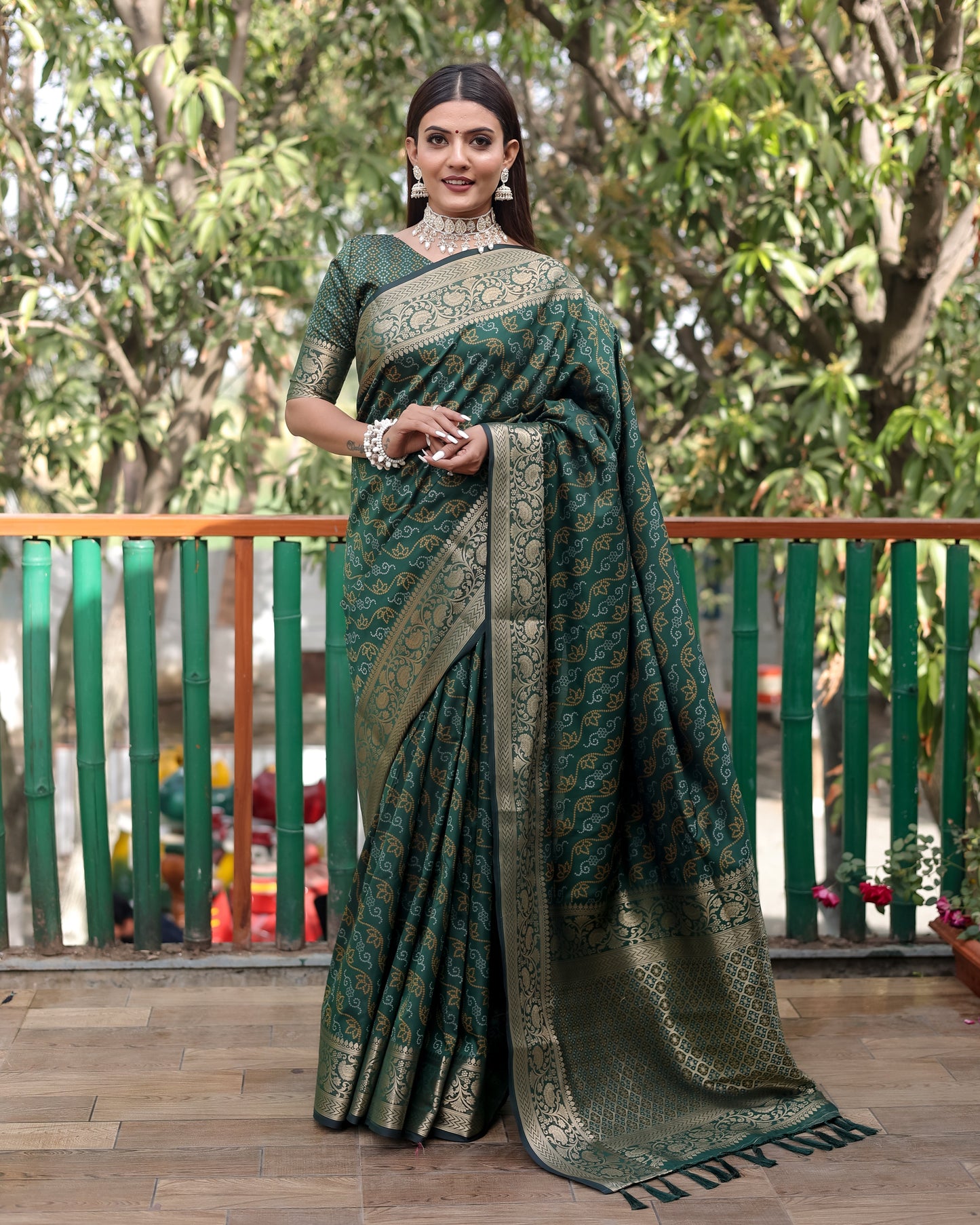 Shining Bandhej Patola Green Color Silk Sarees