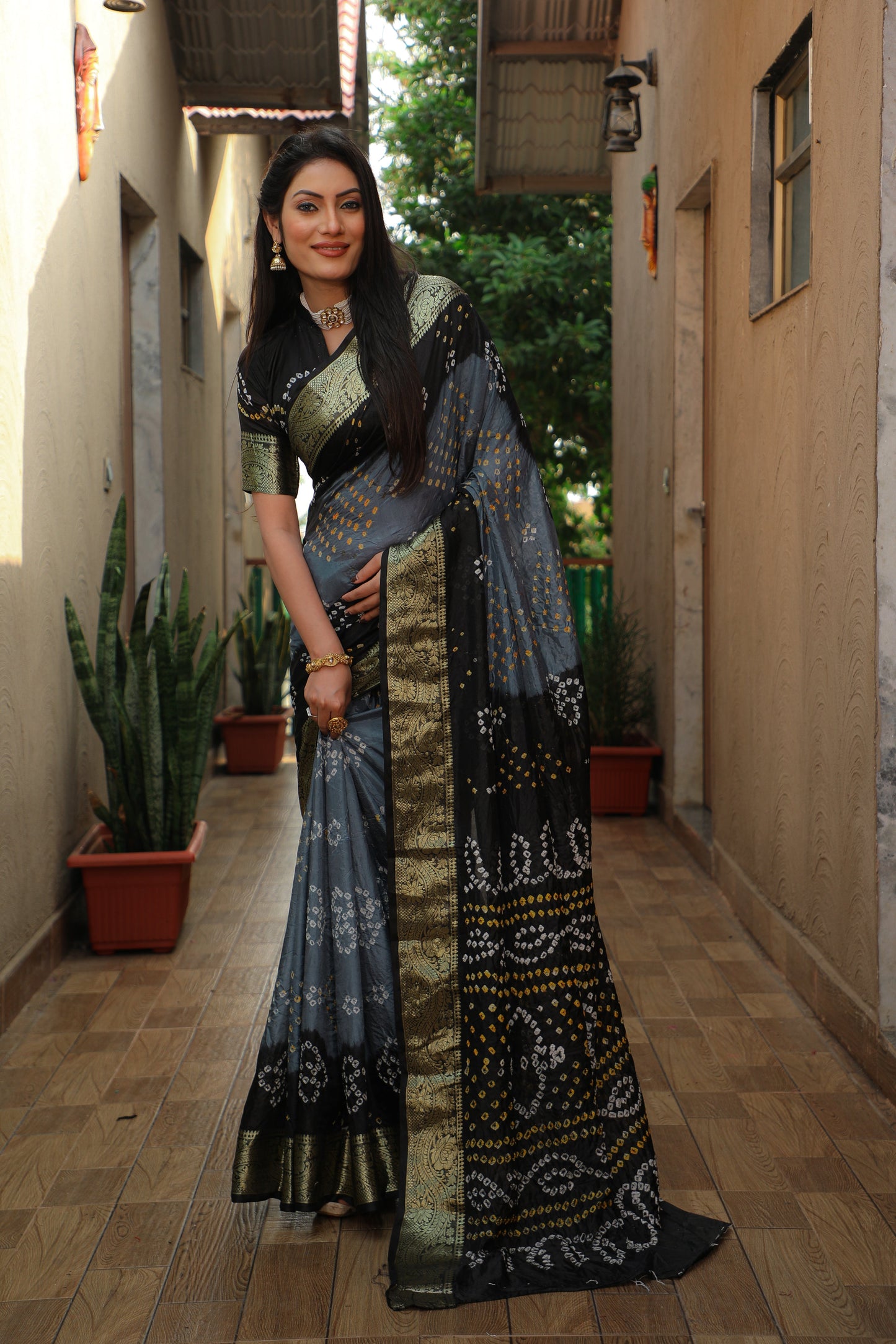 Glimmering Bandhej Grey Color Silk Sarees