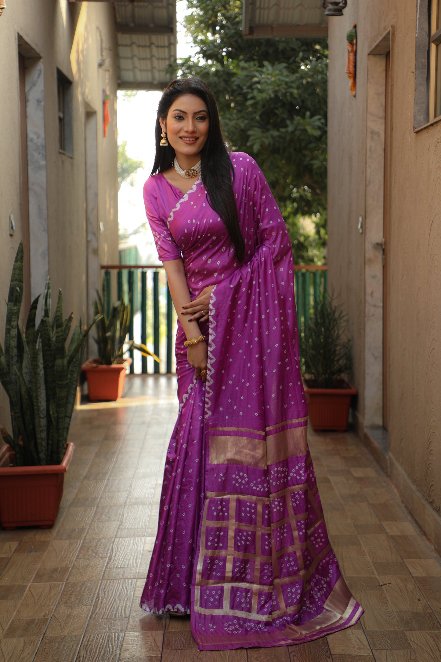 Luxuriant Bandhej Purple Color Silk Saree