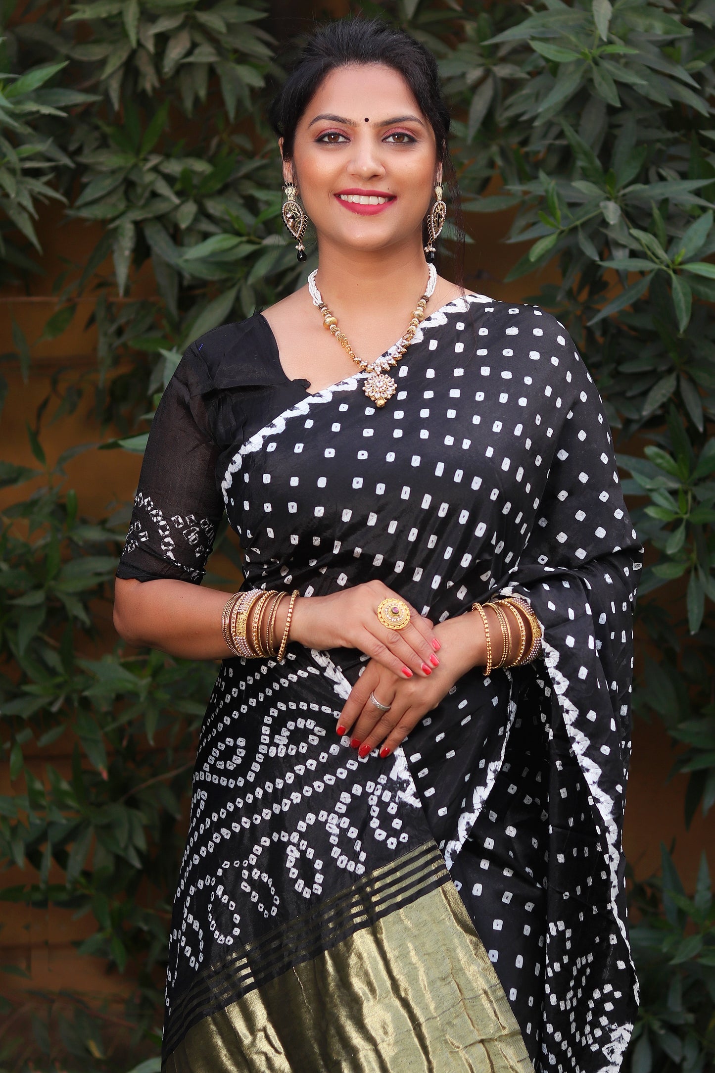 Glorious Bandhej Black Color Silk Saree