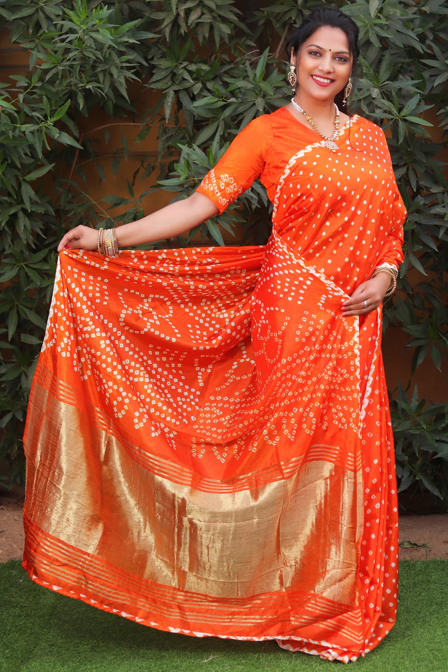 Glorious Bandhej Orange Color Silk Saree