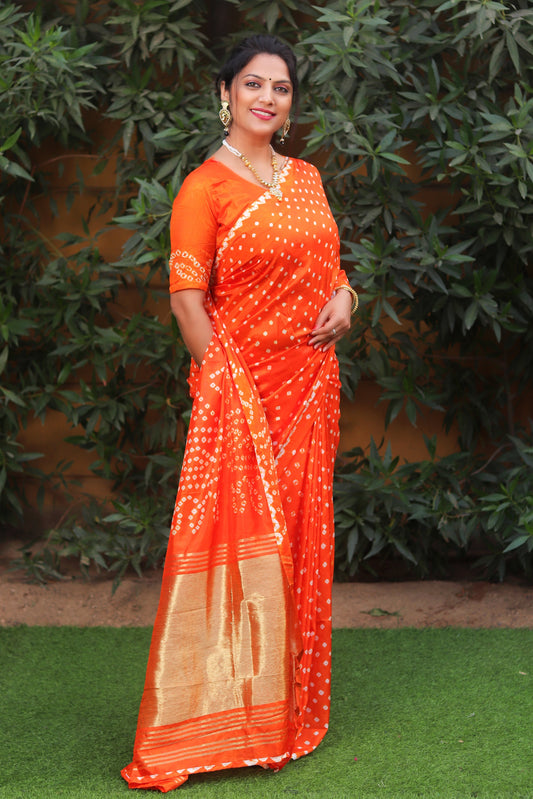 Glorious Bandhej Orange Color Silk Saree