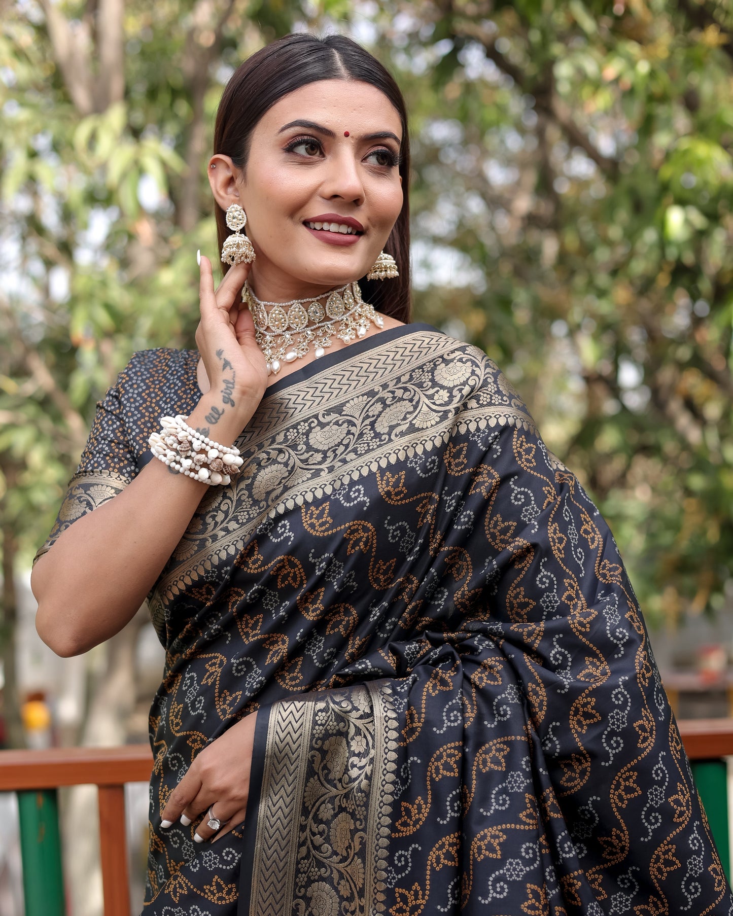 Shining Bandhej Patola Black Color Silk Sarees