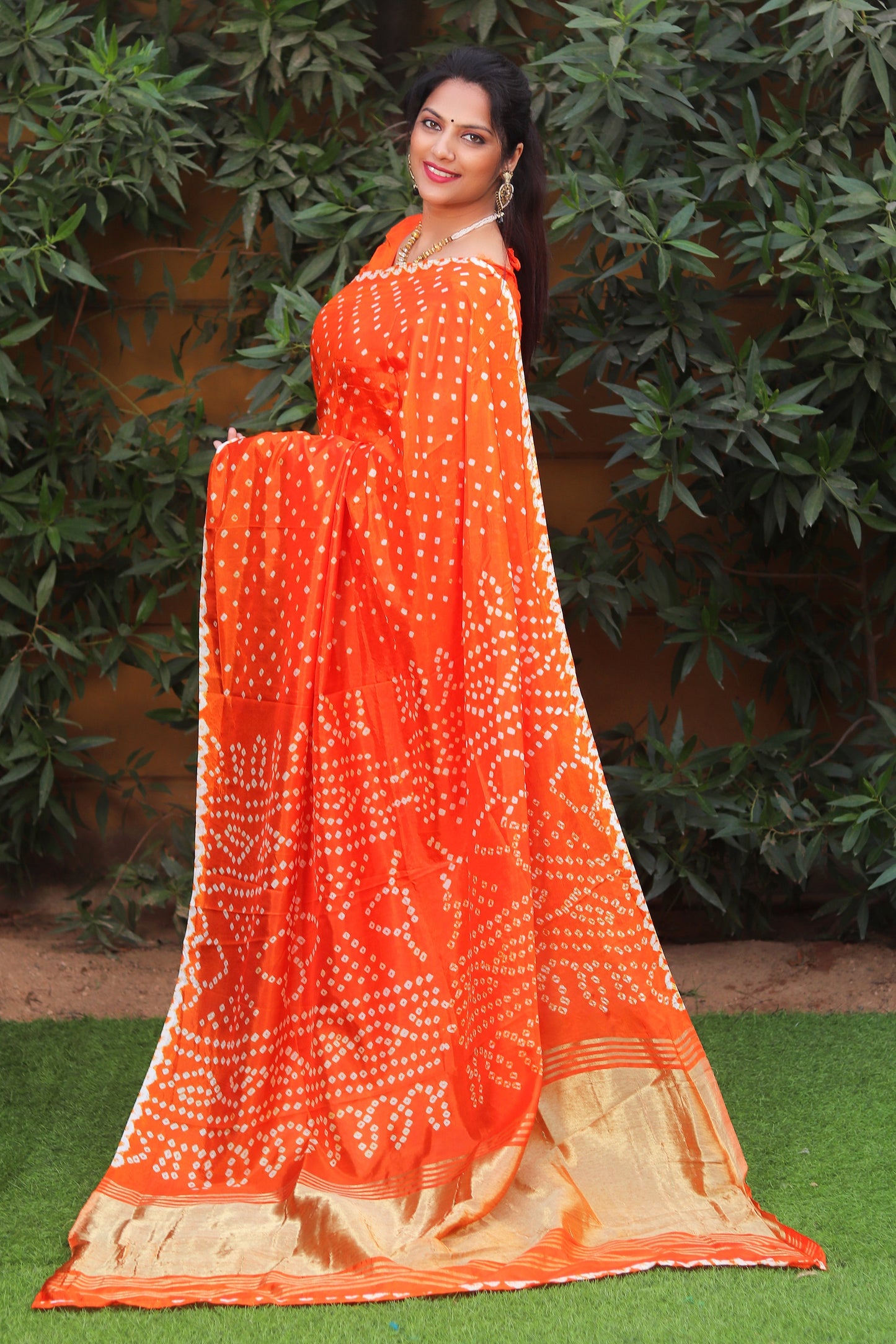 Glorious Bandhej Orange Color Silk Saree