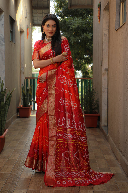 Glimmering Bandhej Orange Color Silk Sarees