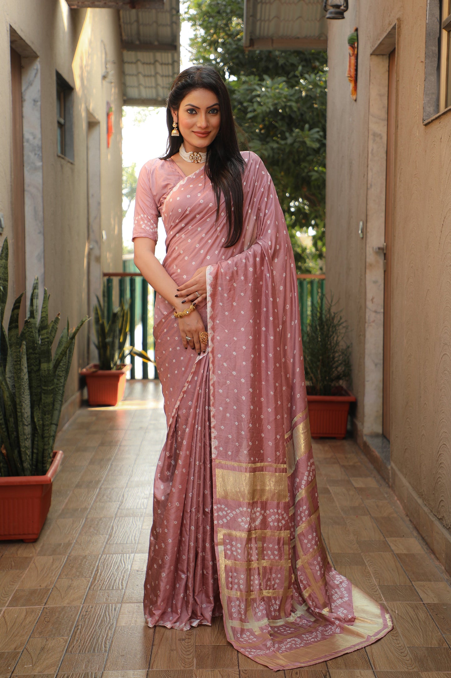 Luxuriant Bandhej Peach Color Silk Saree