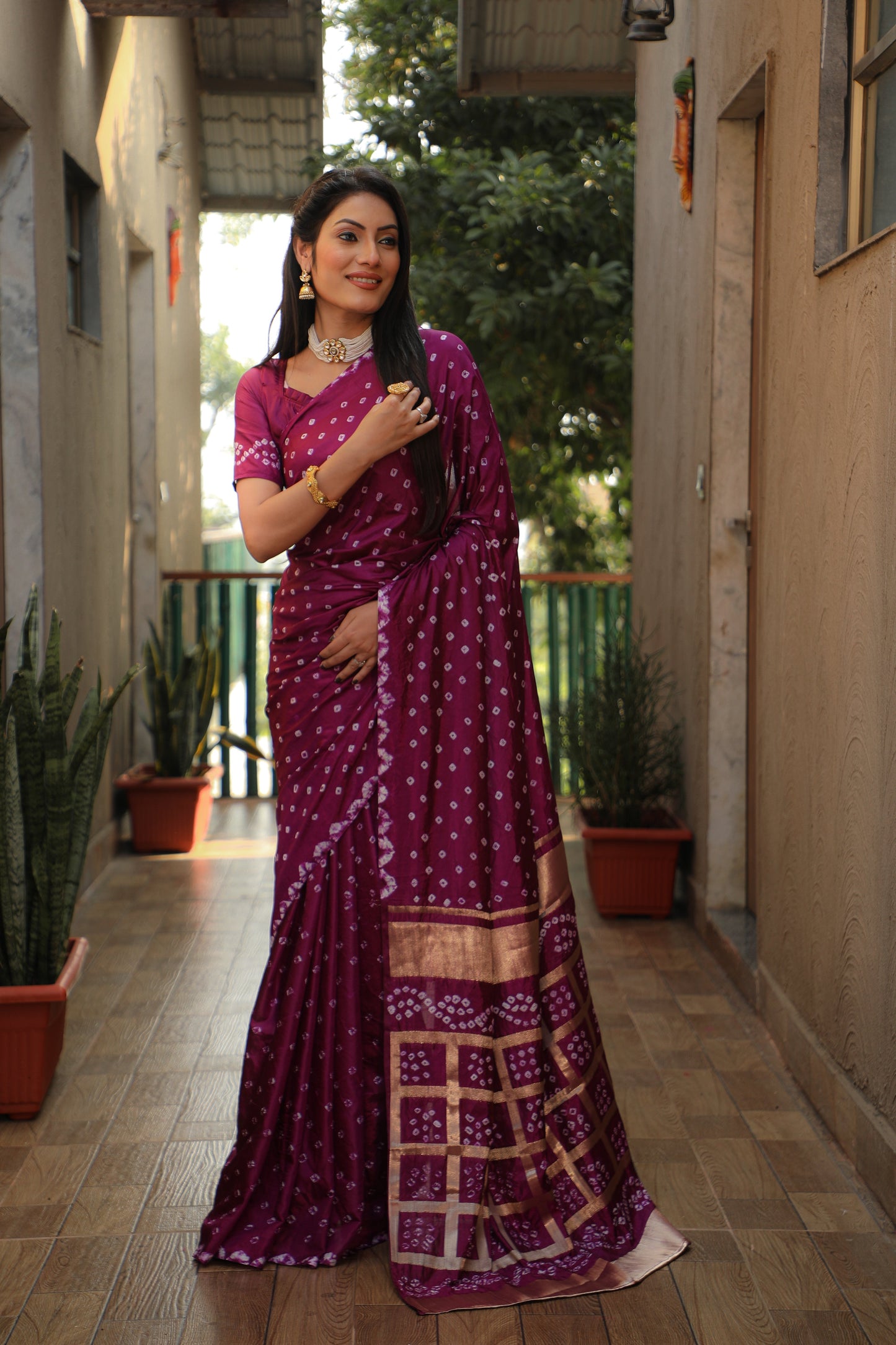 Luxuriant Bandhej Wine Color Silk Saree