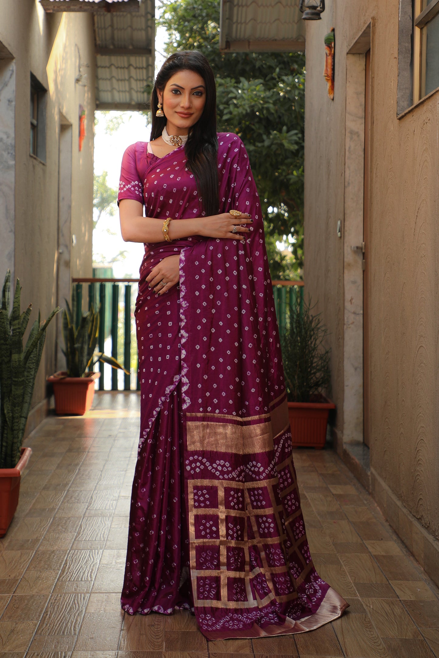 Luxuriant Bandhej Wine Color Silk Saree