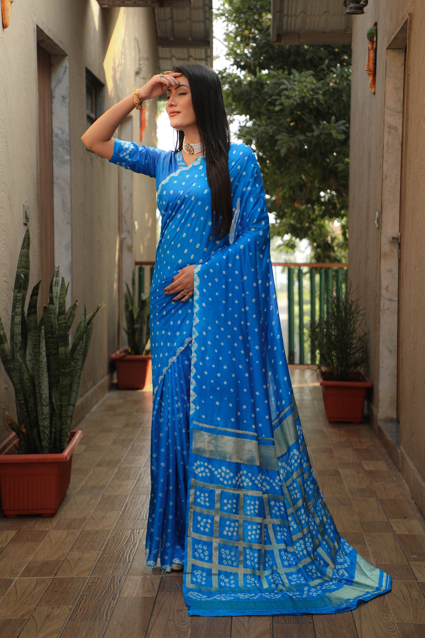 Luxuriant Bandhej Blue Color Silk Saree