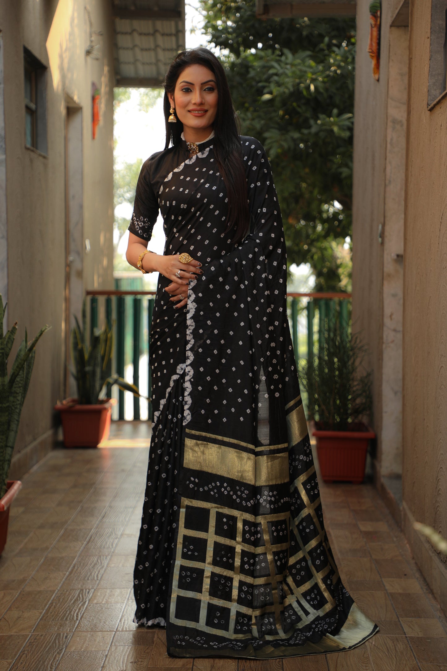 Luxuriant Bandhej Black Color Silk Saree