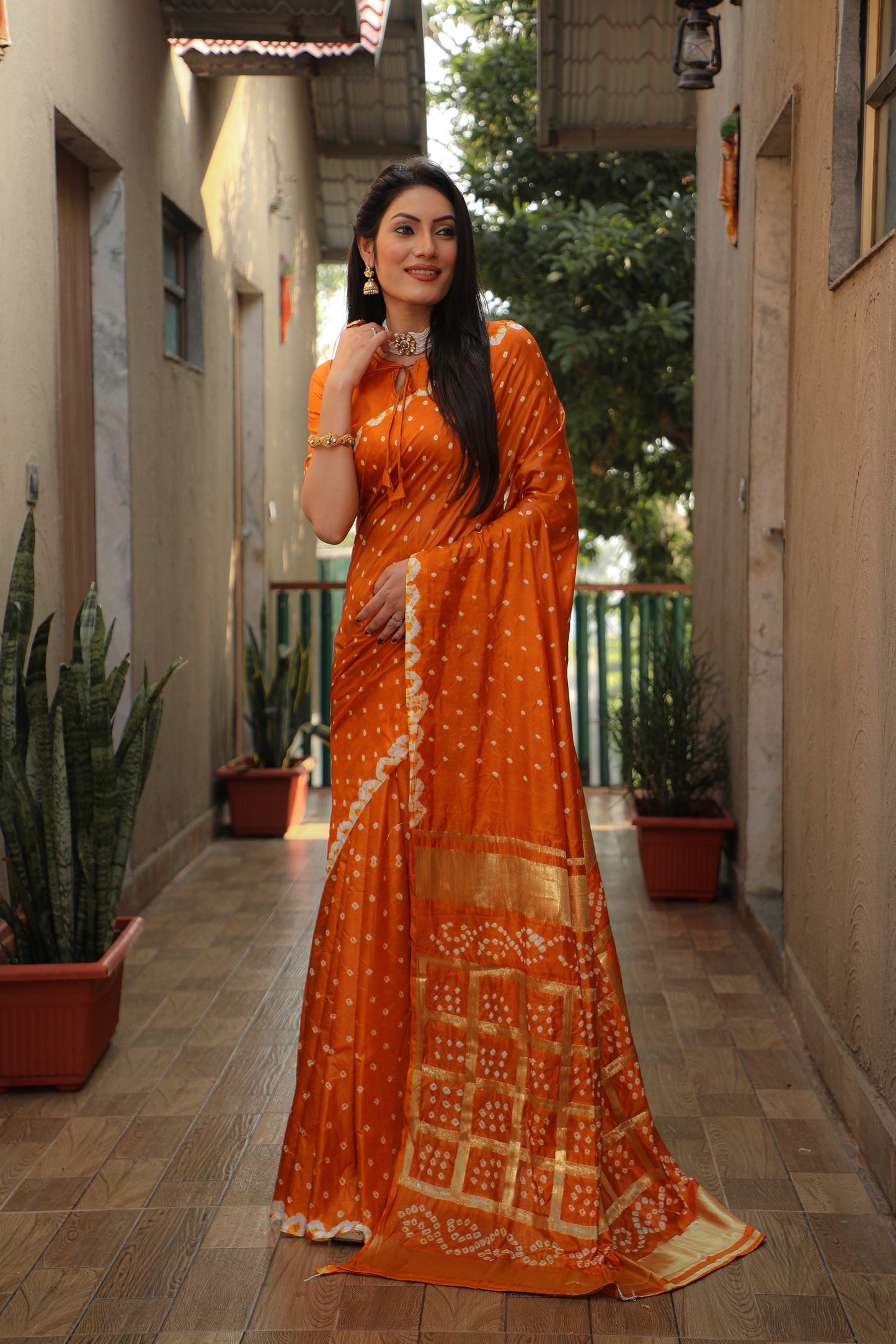 Luxuriant Bandhej Orange Color Silk Saree