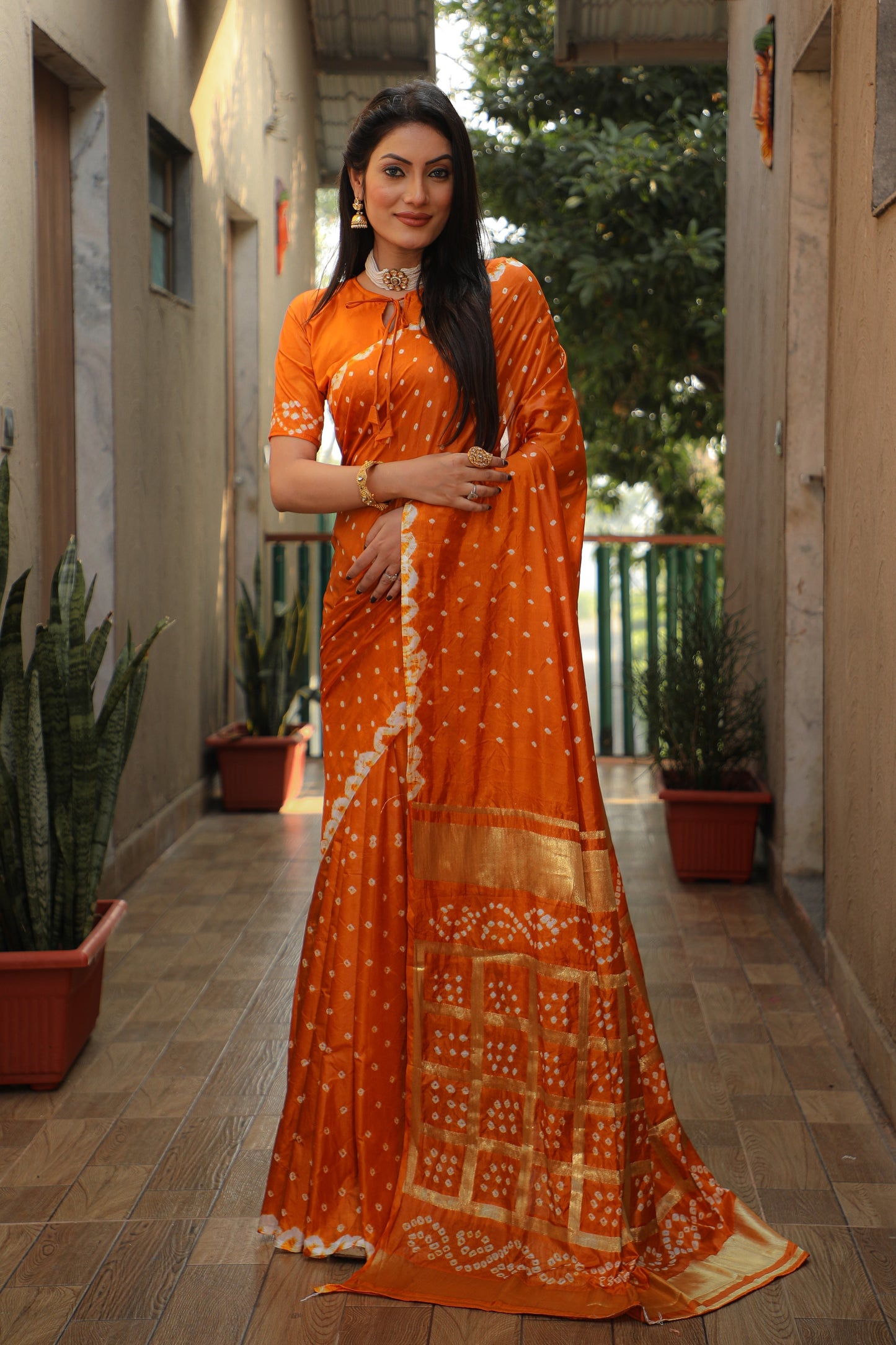 Luxuriant Bandhej Orange Color Silk Saree