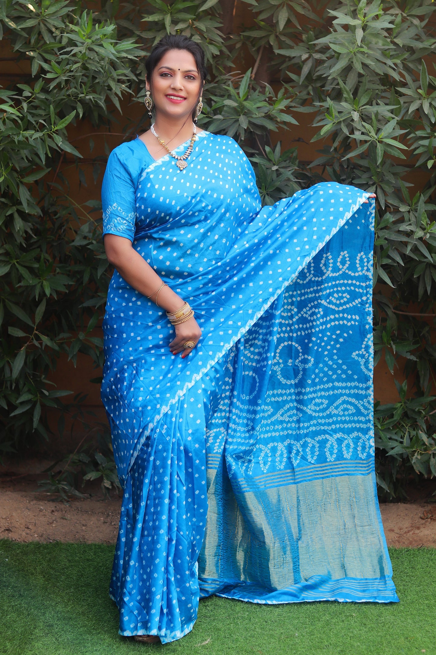 Glorious Bandhej Blue Color Silk Saree