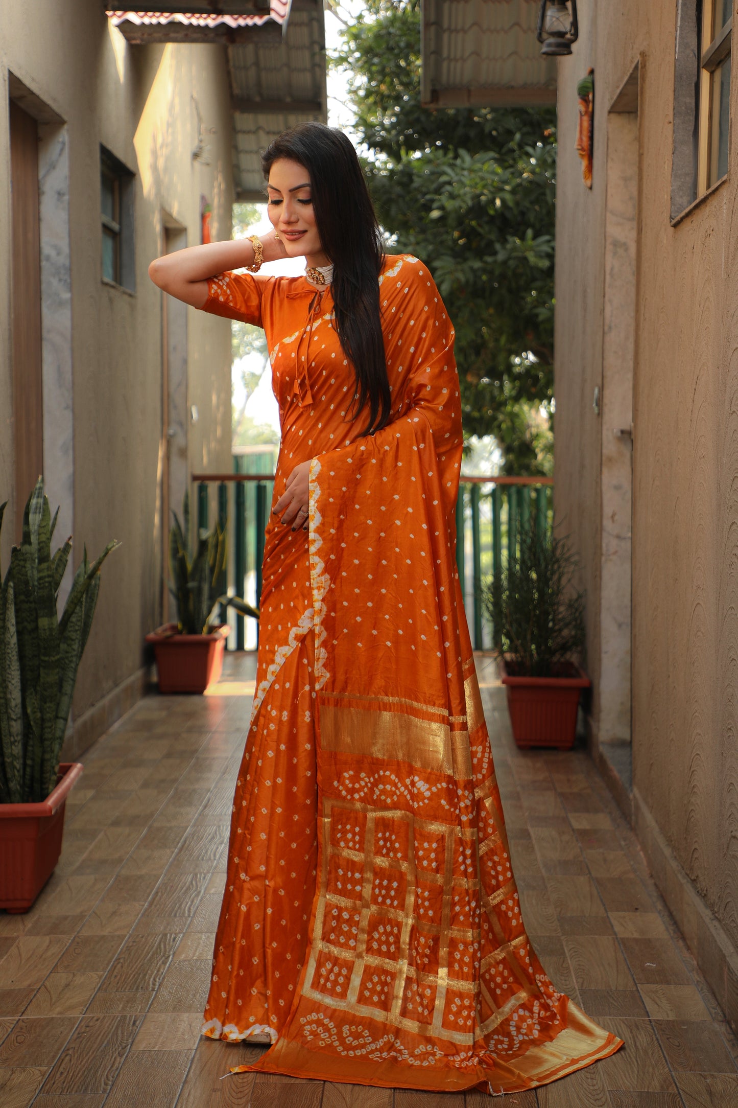 Luxuriant Bandhej Orange Color Silk Saree