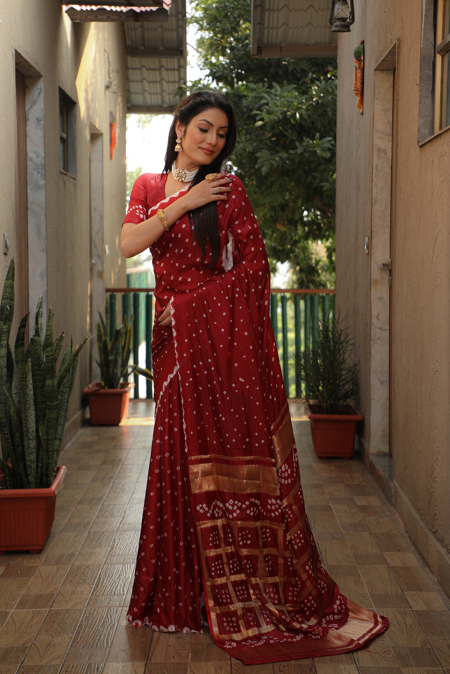 Luxuriant Bandhej Maroon Color Silk Saree