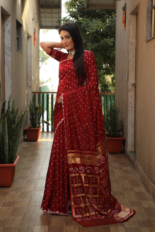 Luxuriant Bandhej Maroon Color Silk Saree