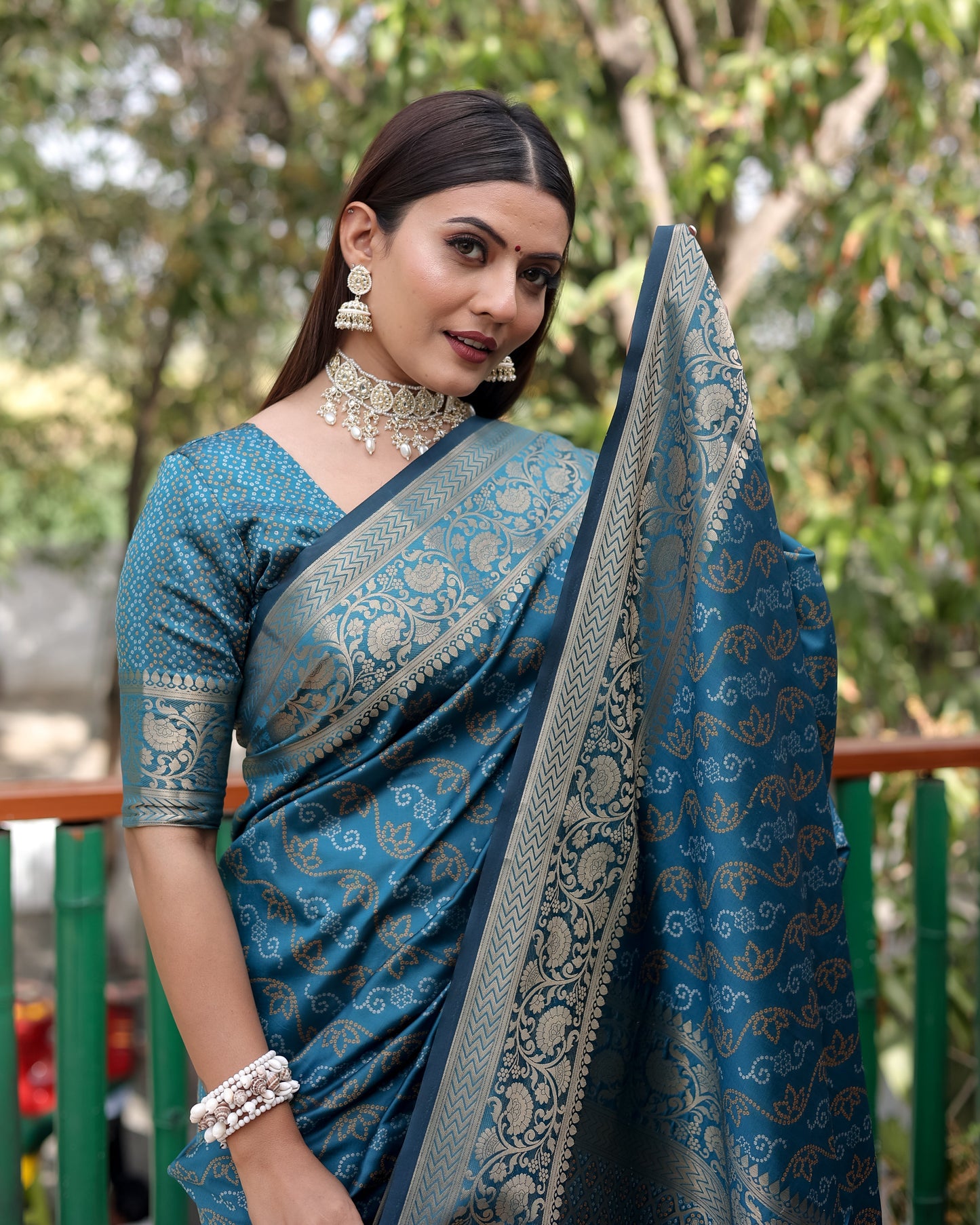 Shining Bandhej Patola Teal Color Silk Sarees