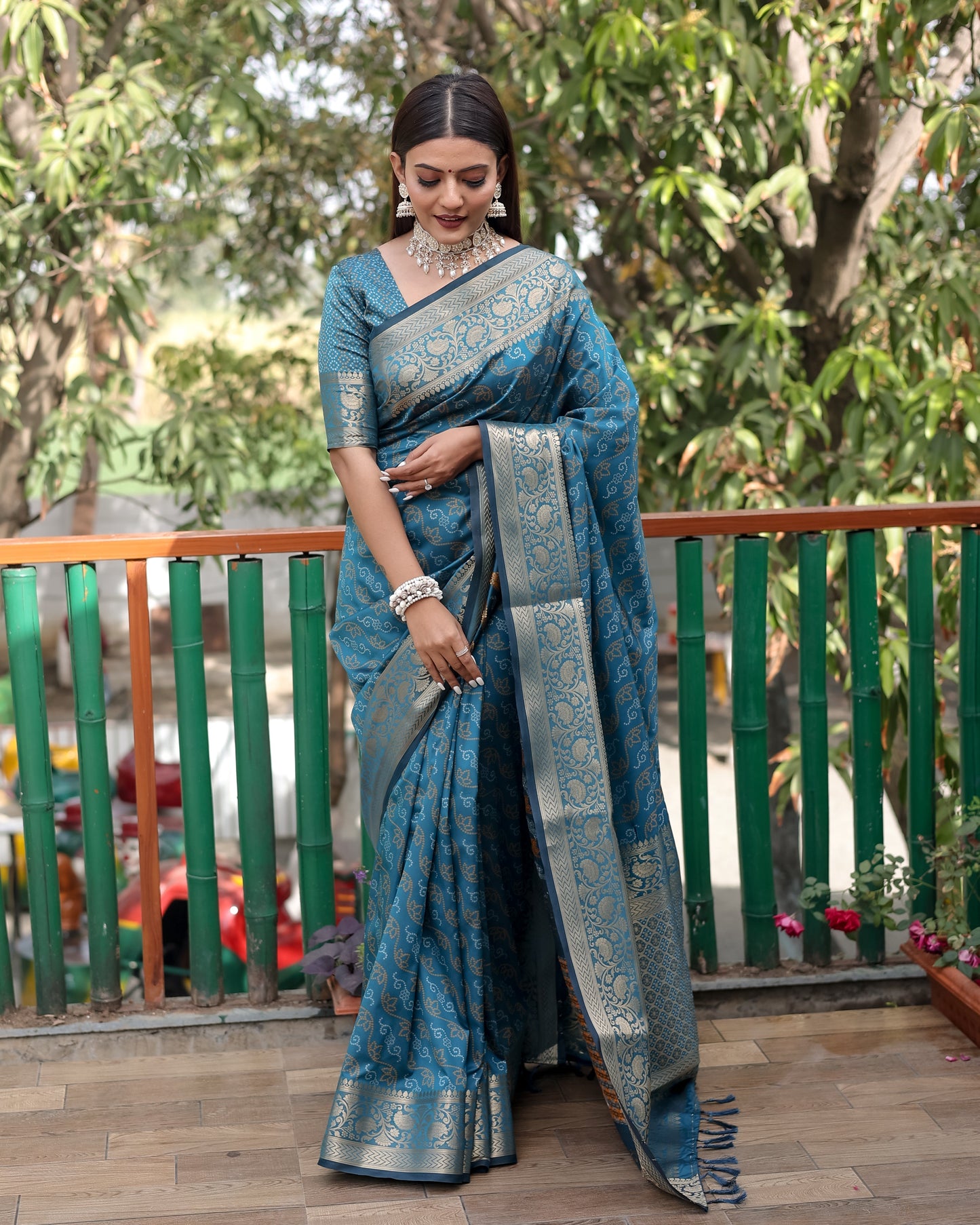 Shining Bandhej Patola Teal Color Silk Sarees