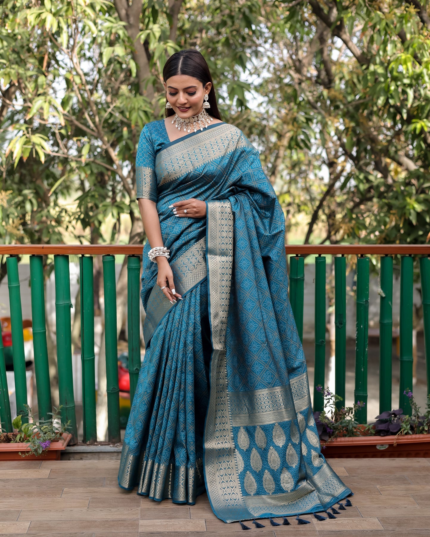 Embellished Silk Bandhej Teal Blue Color Patola Sarees