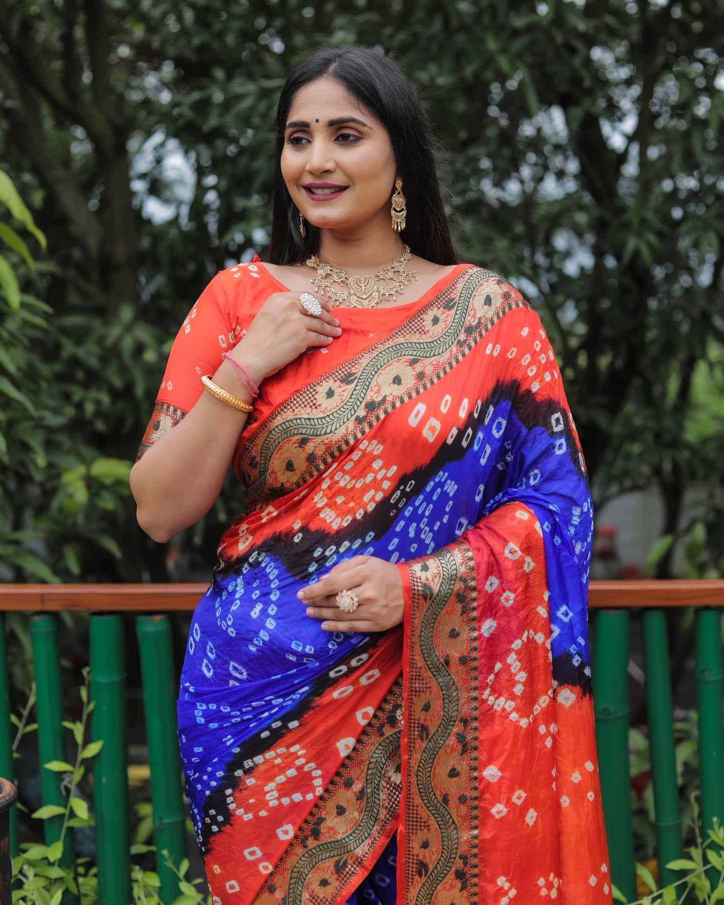 Imposing Bandhej Blue Color Soft Silk Saree