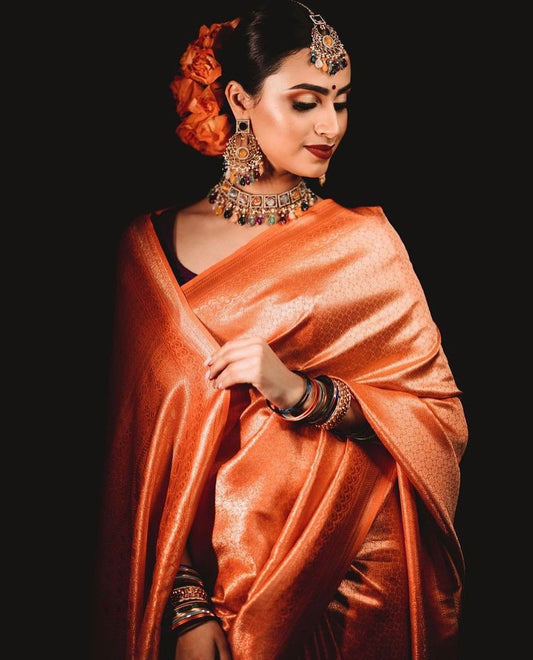 Eyes Catching Orange Color Jacquard Work Silk Saree