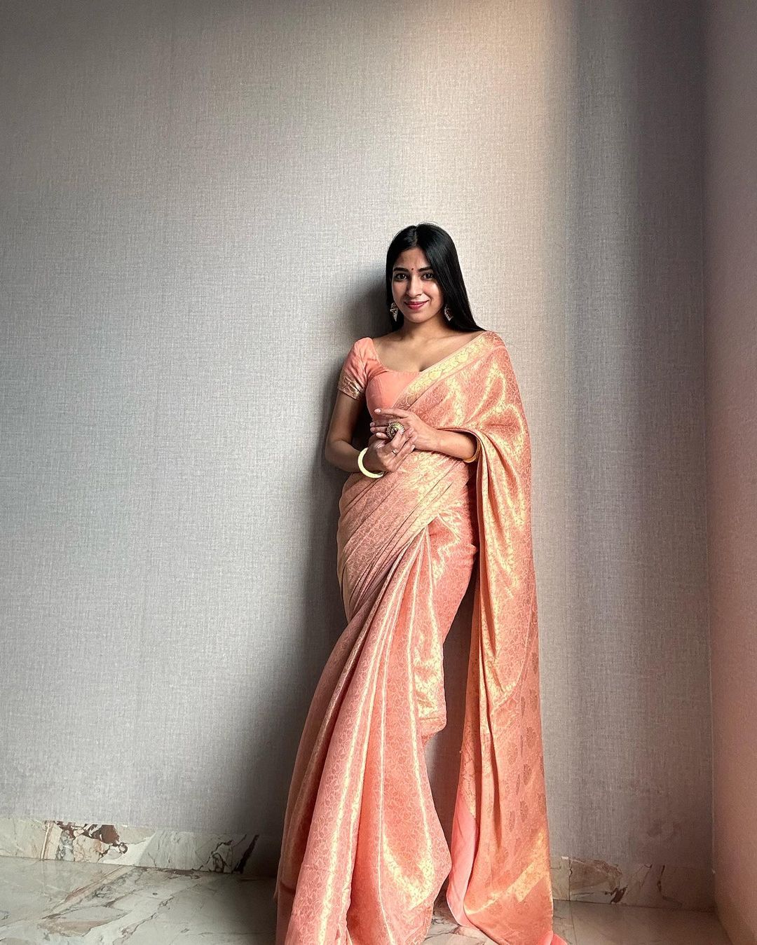 Flattering  Jacquard Peach Color Silk Saree