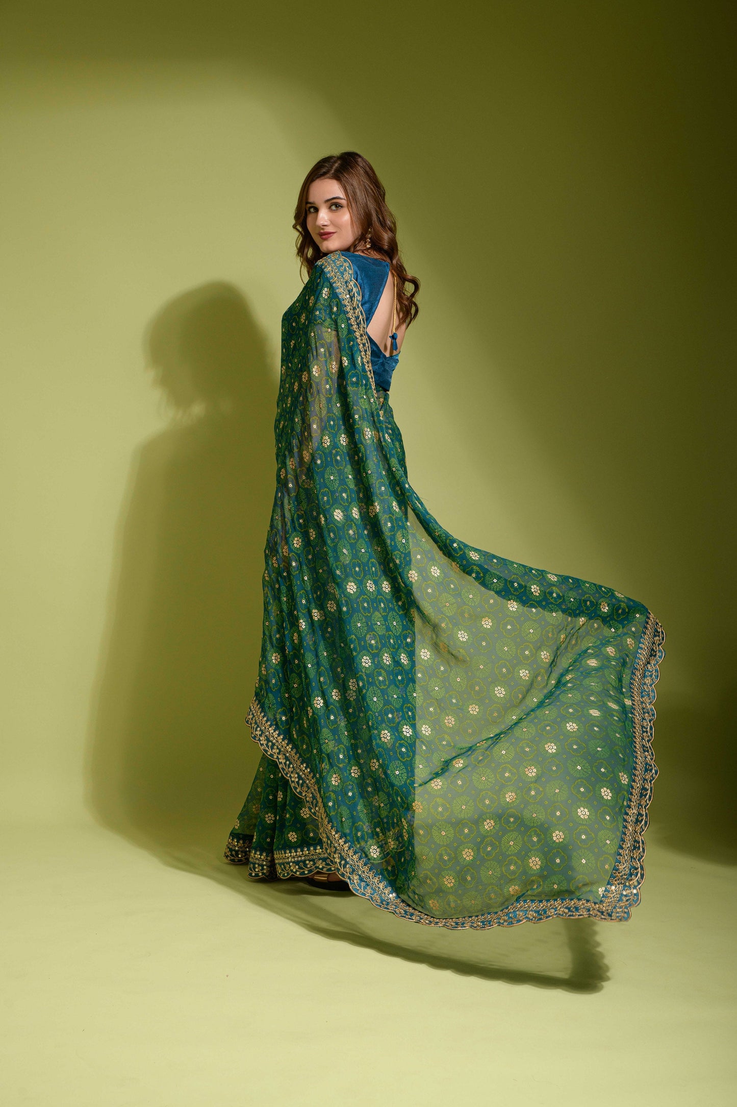 A Glorious Sequence Dark Green Color Saree