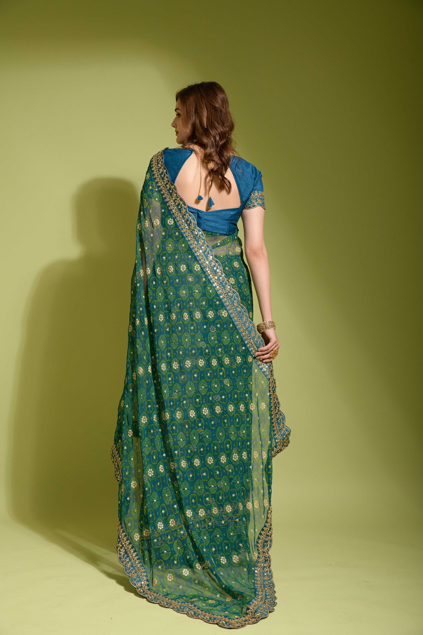 A Glorious Sequence Dark Green Color Saree