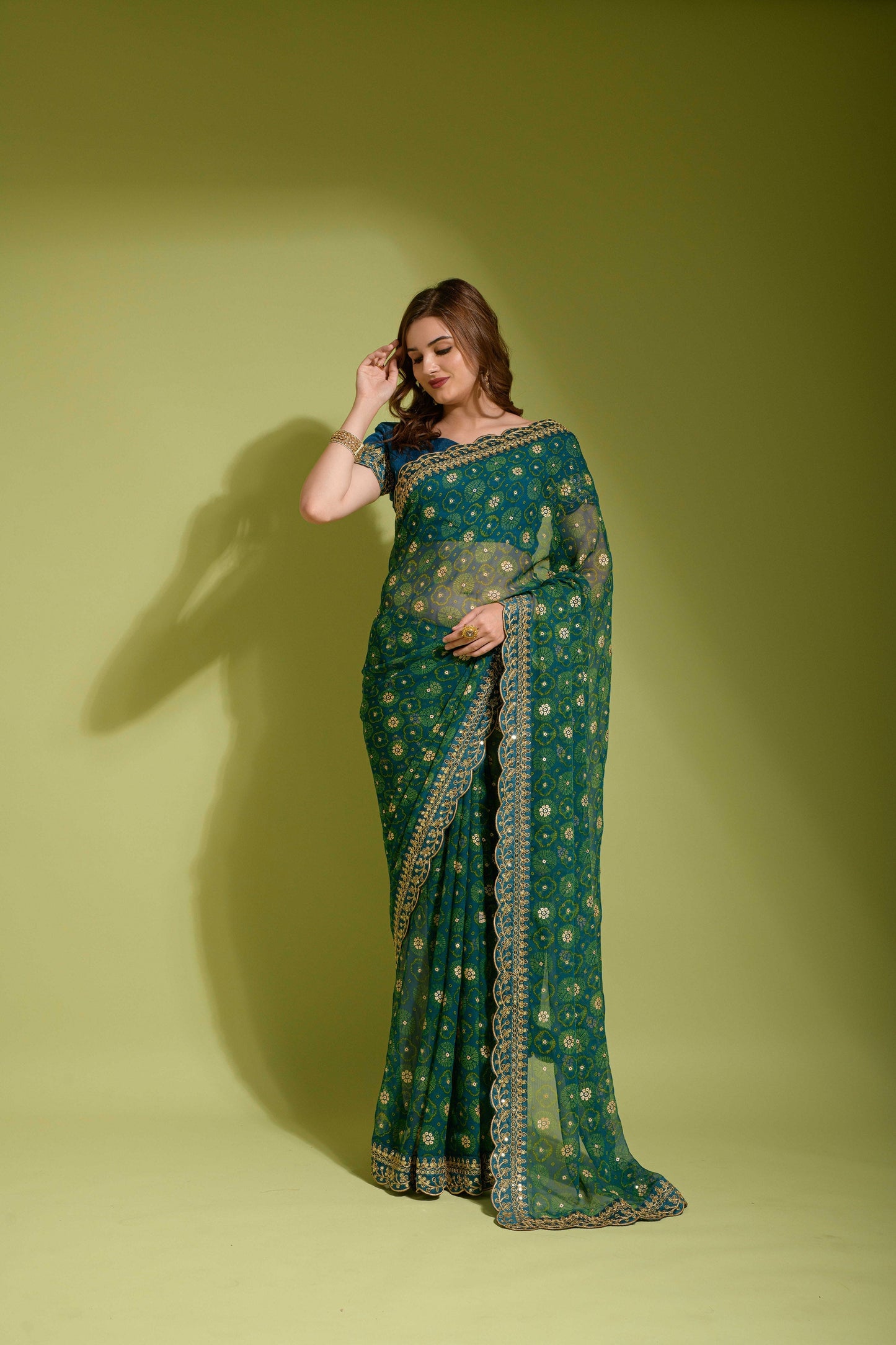 A Glorious Sequence Dark Green Color Saree