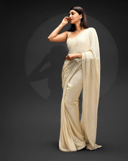 A Elegant Bollywood Sequence Off White Color Saree