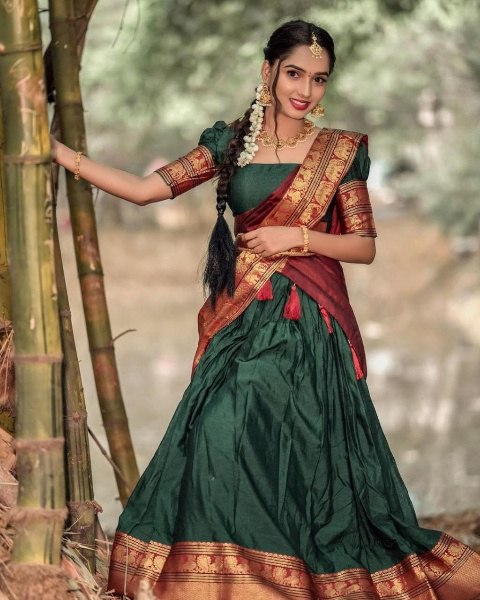 Imposing Kanjiveram Silk Green Color Lehenga Saree