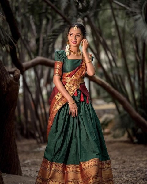 Imposing Kanjiveram Silk Green Color Lehenga Saree