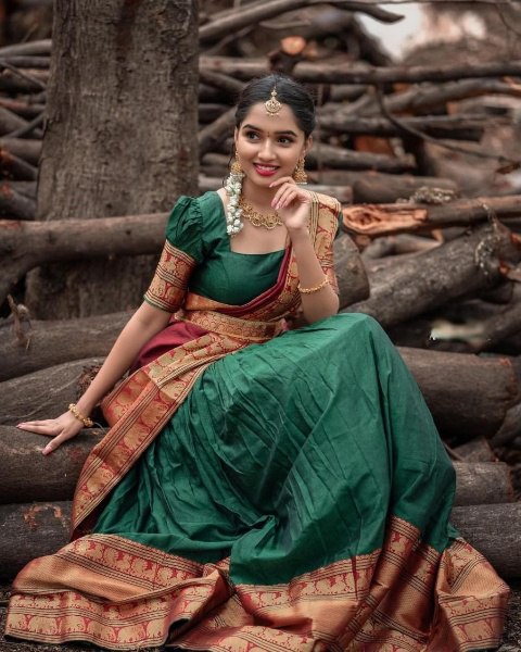 Imposing Kanjiveram Silk Green Color Lehenga Saree