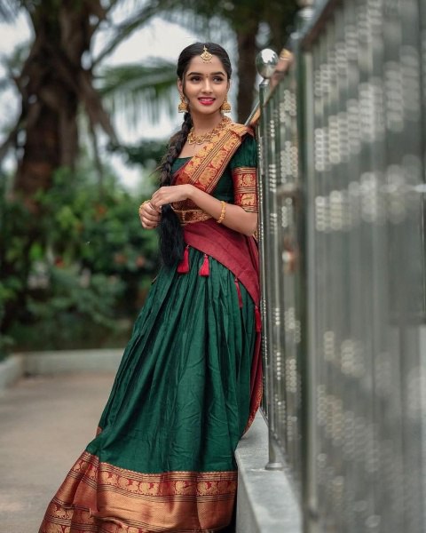 Imposing Kanjiveram Silk Green Color Lehenga Saree