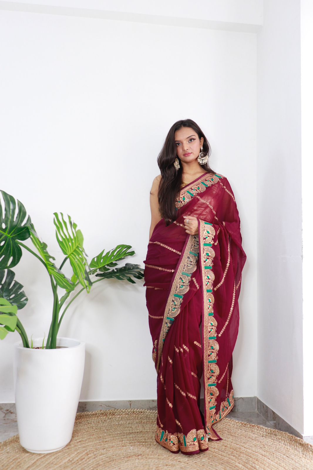 Glimmering Georgette Maroon Color Saree