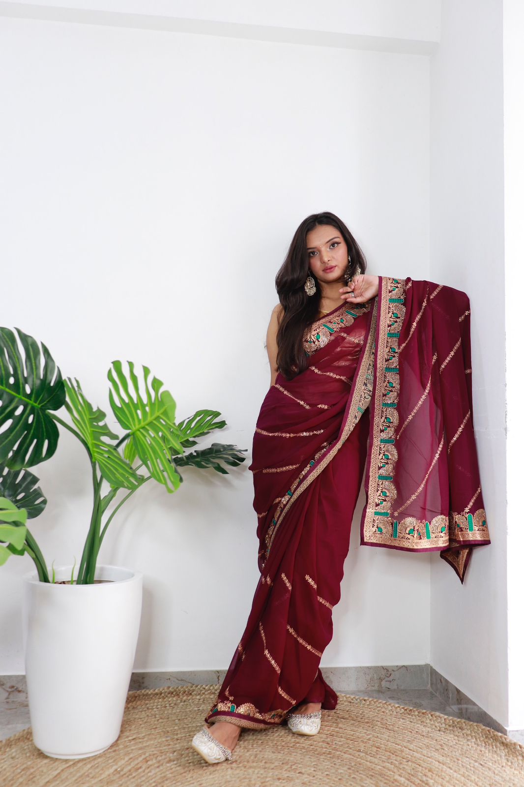 Glimmering Georgette Maroon Color Saree