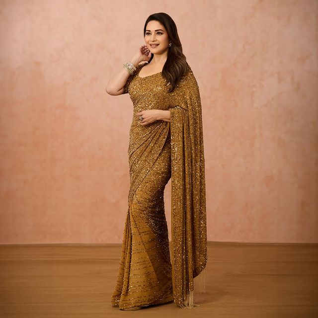 Luxuriant Beige Color Georgette Saree