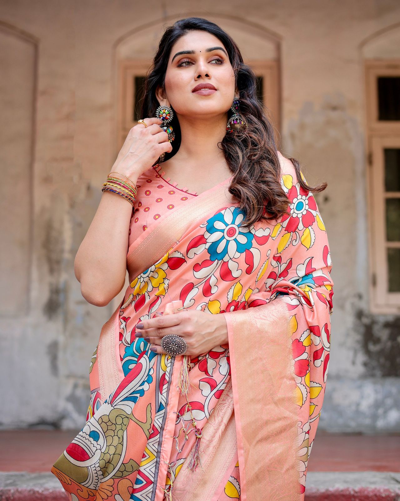 Imposing Peach Color Printed Silk Saree