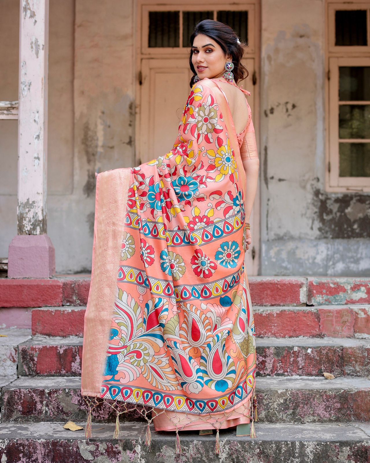 Imposing Peach Color Printed Silk Saree