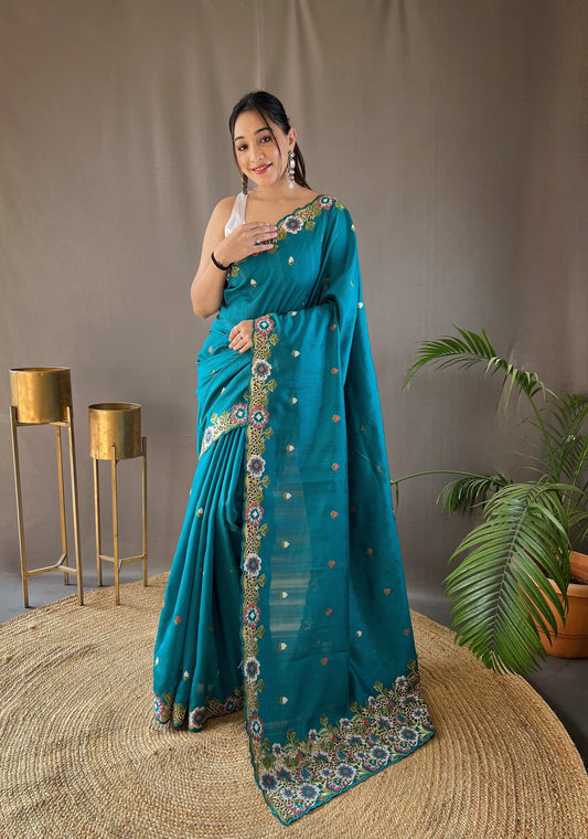 Opulent Embroided Buttis Blue Color Silk Saree