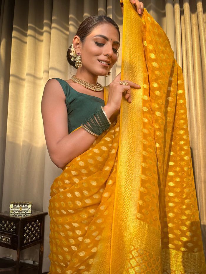 Mesmerizing Lichi Silk Haldi Wear Yellow Color Saree