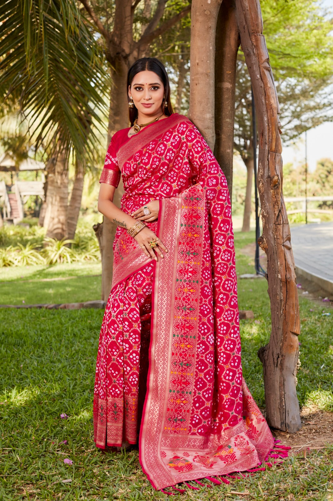 Delightful Pink Color Gharchola Bandhej Silk Saree