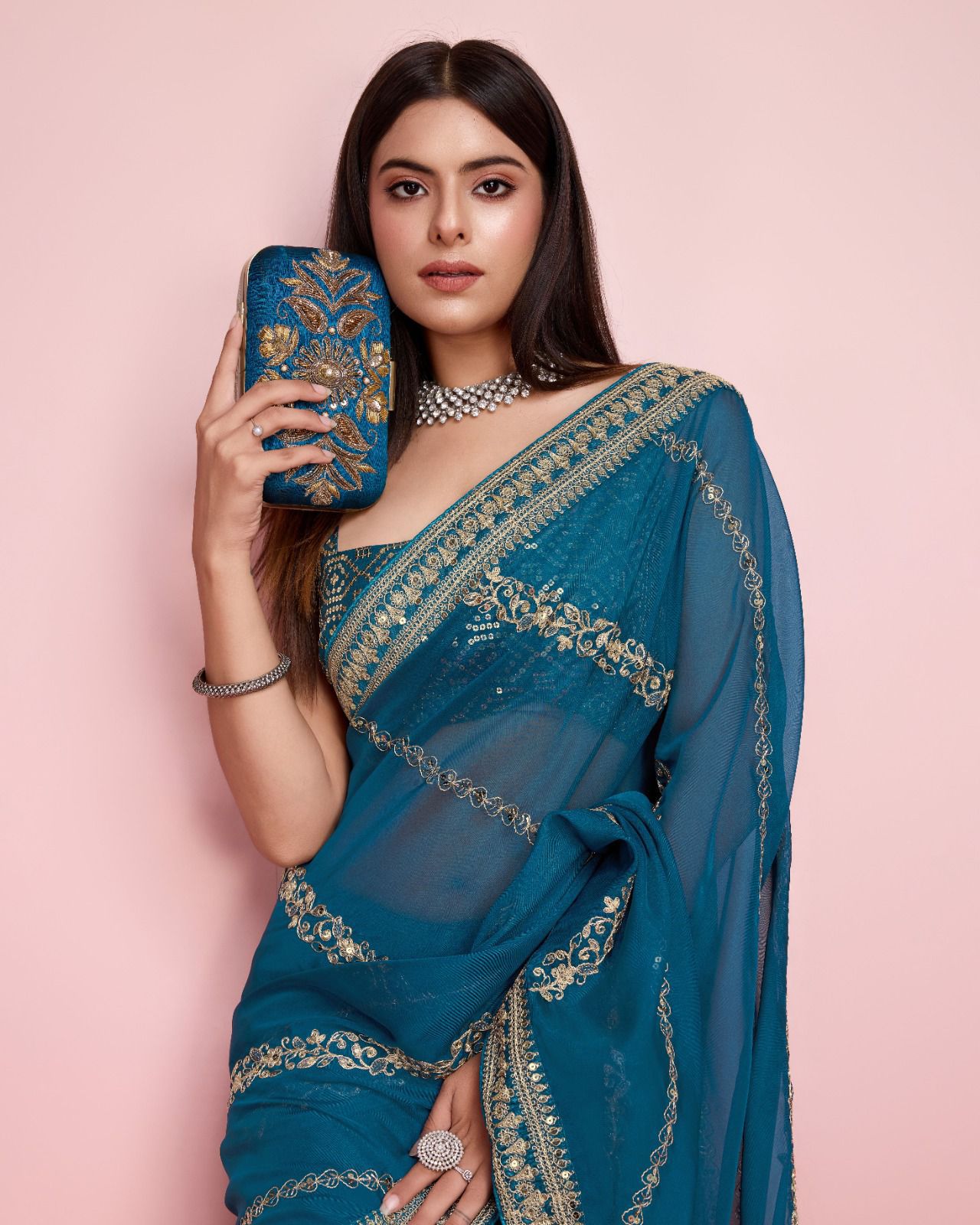 A Innovative Teal Blue Color Taby Silk Saree